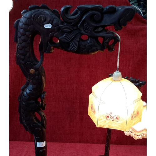 153 - Solid wood Oriental carved Dragon standard lamp with matching side lamp (both working)