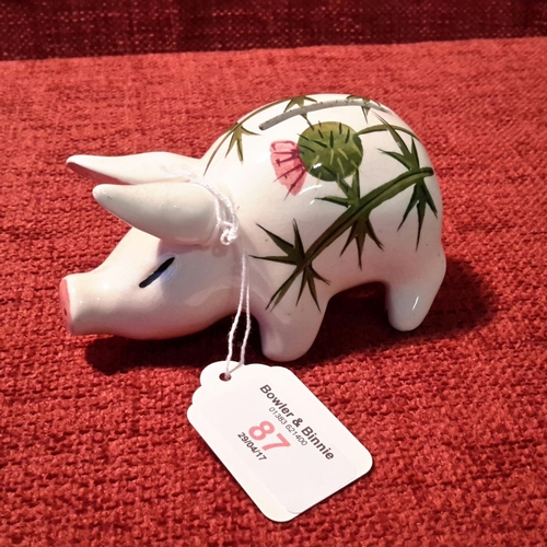 87 - Plichta pig bank with hand painted thistle design, 11cm