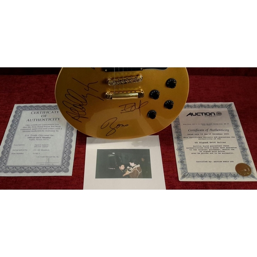 90 - Gold electric guitar with U2 signatures, together with 2 certificates of authenticity & a picture of... 