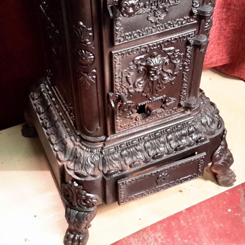 95 - French style cast iron wood burning stove with ornate trim & claw support feet, 87x47cm