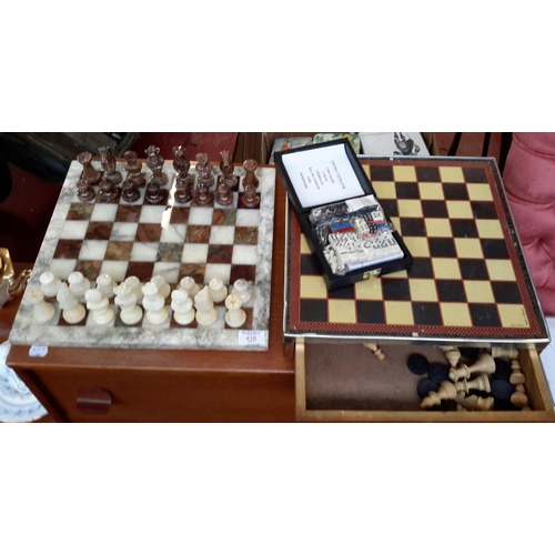 416 - 2 chess boards with pieces