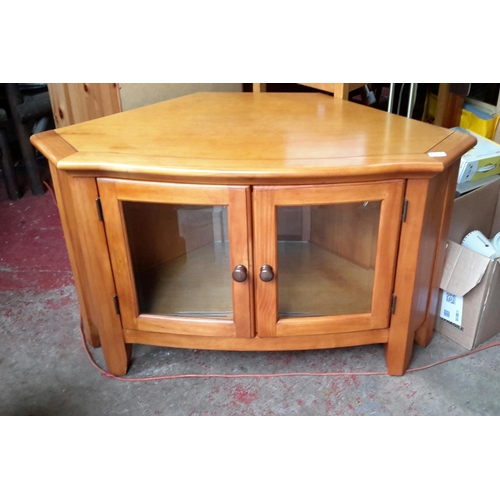 468 - Glass tv unit in light wood