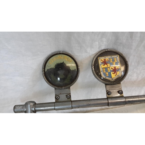 273 - A collection of vintage car badges with bar, 2 Lucas head lamps & vintage mirror