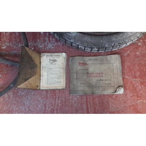 304 - 1920's 2 Trojan brochures, 3 Wheels, steering wheel, 2 various tools & radiator