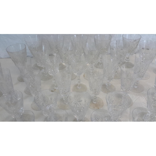 502 - A large collection of Edinburgh crystal goblets, brandy & wine glasses