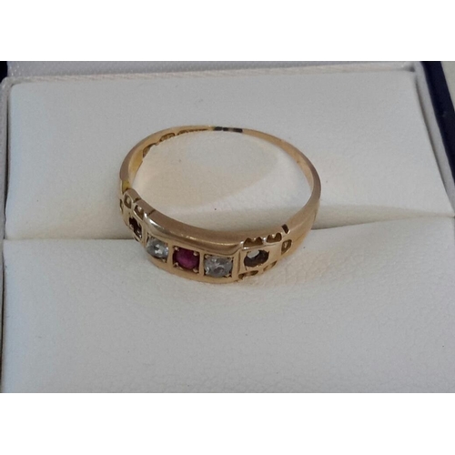 53 - A 15ct gold ring with diamond & red stone setting (scrap)