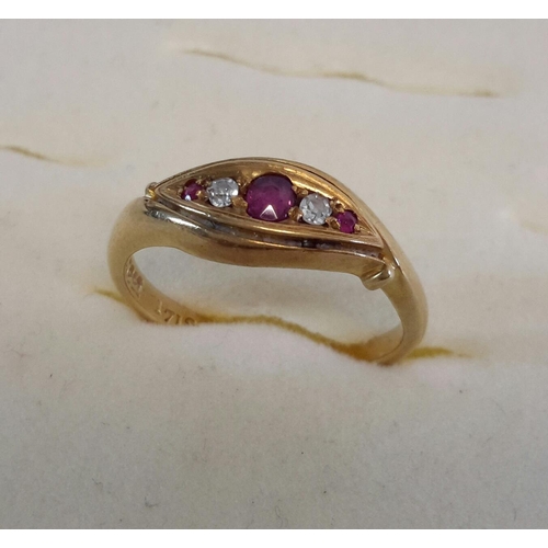 61 - A 18ct gold ladies dress ring with diamond and pink stone setting, has date 1719 stamped on band