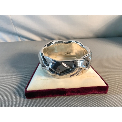 75 - Large silver filled designer bangle.