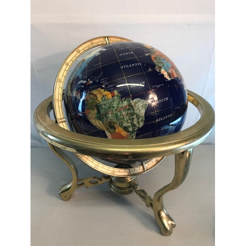 118 - Medium sized semi precious stone globe fitted on a brass stand