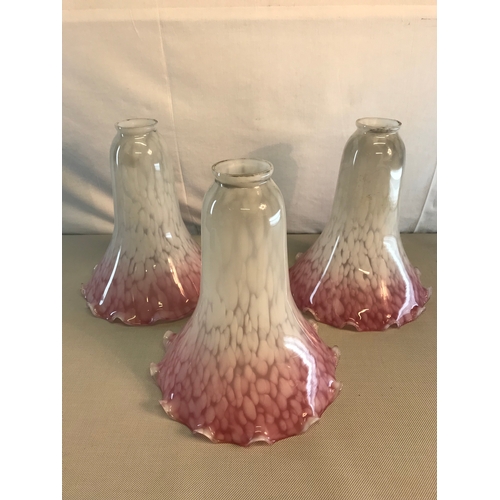 159 - 3 Antique White and pink fluted shades. with pinched rims. 25cm in height. 20cm in diameter.