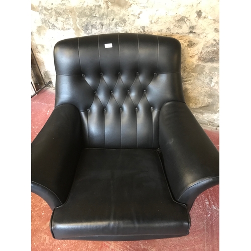 343 - 1960's 70's faux leather, Button back swivel chair