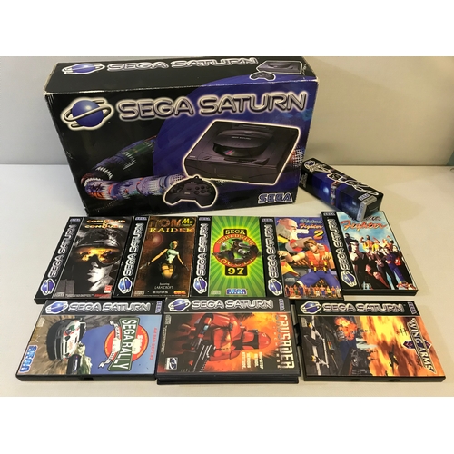 419 - Sega Saturn Console system, comes with 8 games & RF Unit. Mint condition