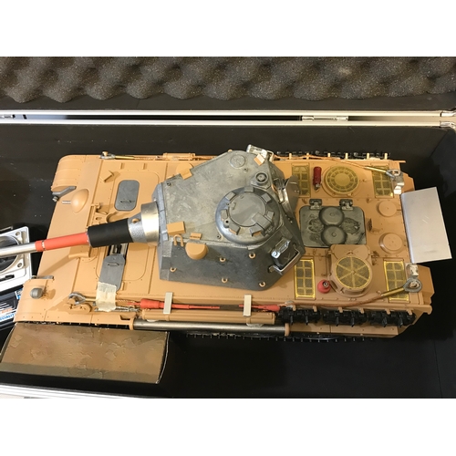 464 - Heavy detailed remote controlled tank. Comes with carry case and remote, Mostly made from metal.