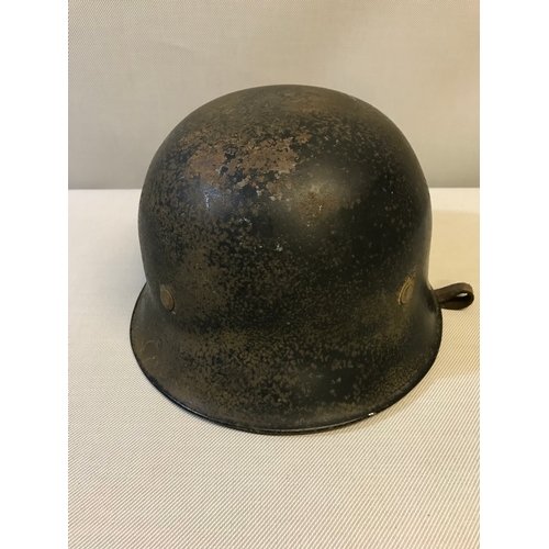 51 - WW2 German police/ fireman helmet with two decals, Swastika & eagle insignia. Original leather liner... 