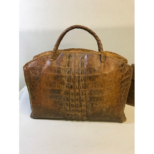 192 - 2 Vintage c1920's Crocodile leather hand stitched hand bag and carry bag. (Both in great condition)