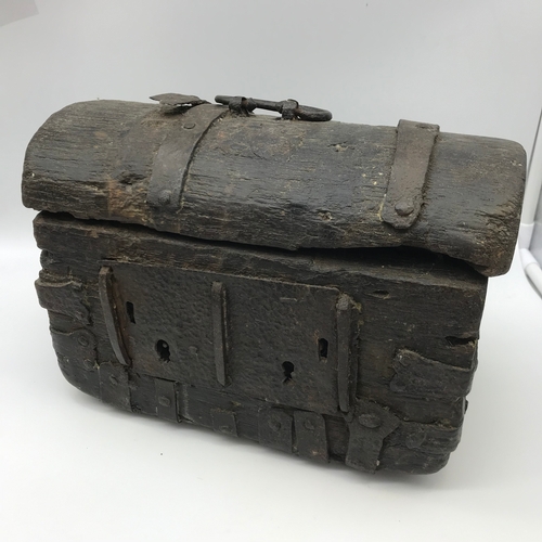 276 - A 15TH/ 16TH Century small treasure/ document trunk. Made from wood and cast iron hinges. Measures 2... 