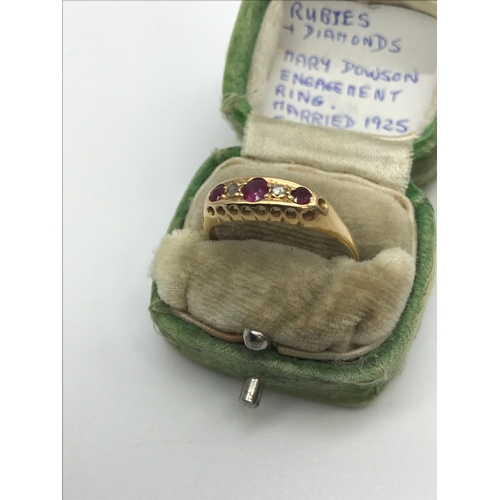 21 - An 18ct gold ladies ring set with 3 Ruby & 2 diamond stones. Originally belonged to Mary Dowson. eng... 