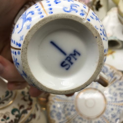 99 - A Collection of porcelain items which includes dragon handle Mason's jug, Victorian hand painted pit... 