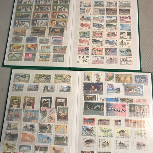 186 - Two albums of stamps both full.