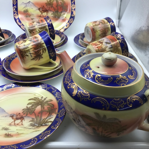 268 - 22 Piece Victoria China Tea set. Comes with tea pot.