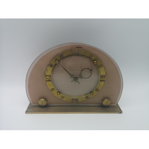 275 - A Smiths electric art deco clock, together with two floral tapestry and gilt design clocks