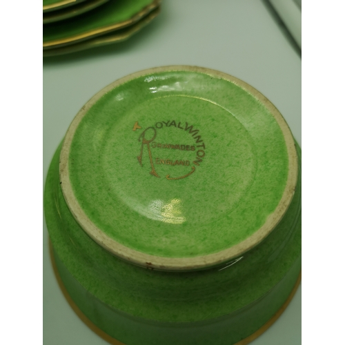 304 - A 19 piece Royal Winton Grimwades tea set in a green and gilt design, with sugar & cream