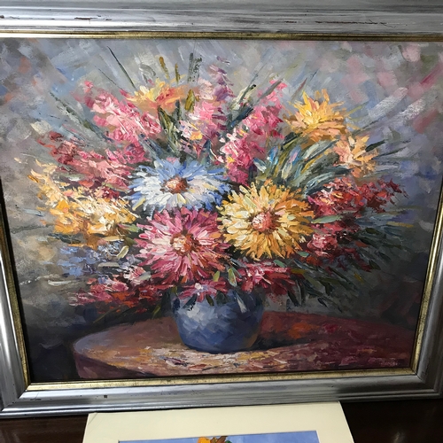 33 - Original oil painting still life flowers on canvas fitted within a silver frame,Together with oil pa... 