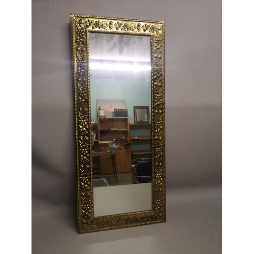 8 - A floral design gilt mirror