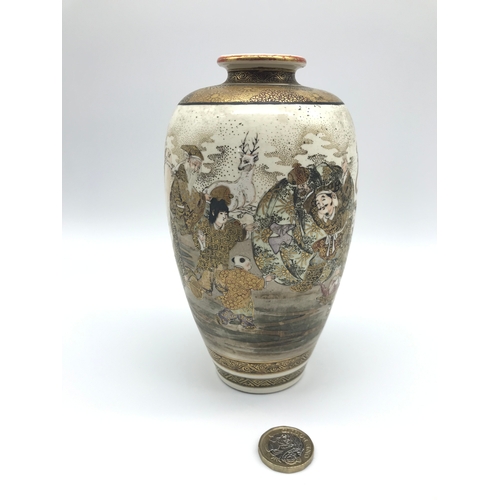 11 - A 19th century Japanese Satsuma highly decorated vase. Depicting The Seven Lucky gods of Japan, figu... 