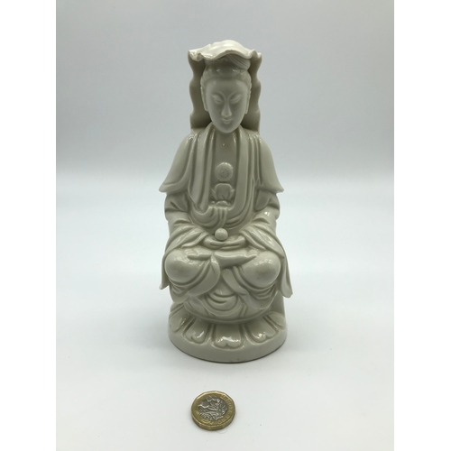 899 - A blanc-de-chine Guanyin, stands 18cm