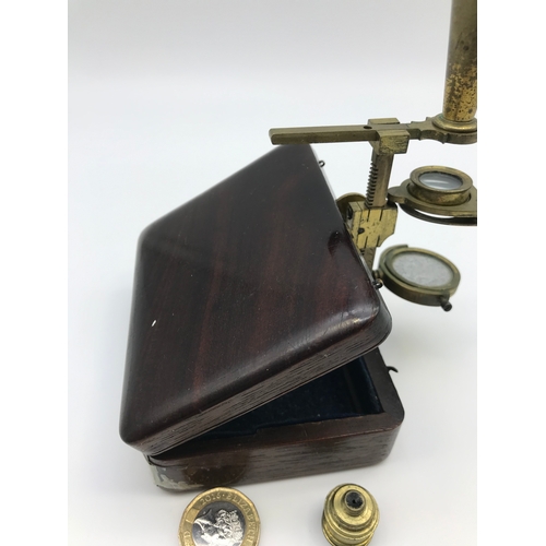 143 - Cary's Gould London Miniature microscope with travel box.