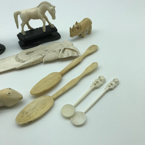 158 - A Lot of early 1900's Bone and ivory carved items which includes carved Elephant head letter opener,... 