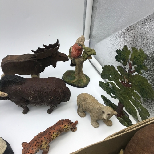 123A - A Large collection of Vintage and antique lead, wood, porcelain animals and figures. Includes Britai... 