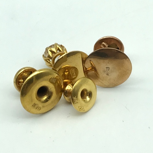 86J - A Lot of three 9ct gold studs [3.6grams] together with a 22ct gold stud with clear glass stone [2.2g... 