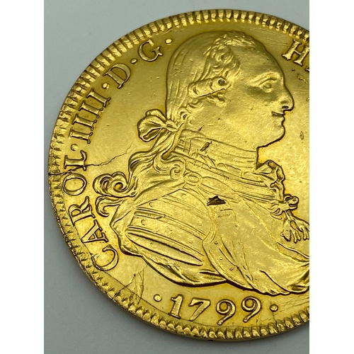 3 - 1799 Carol IIII 8 Escudos Gold coin. [Mint mark M] Diameter of coin 3.7cm. [Weighs 26.73 grams]