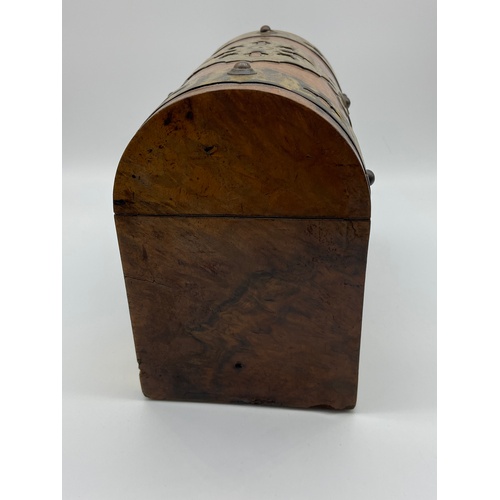 10 - A 19th century Burr walnut and brass tea caddy box. Comes with two lids. Measures 17x23x12cm