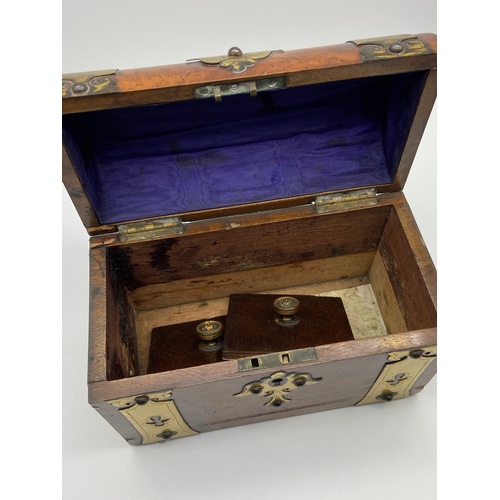 10 - A 19th century Burr walnut and brass tea caddy box. Comes with two lids. Measures 17x23x12cm