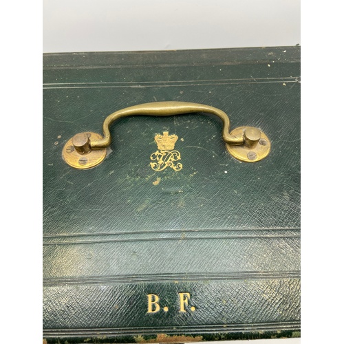 23 - Antique green leather dispatch carry box. Comes with key, book and note detailing whom the case belo... 