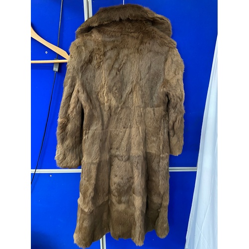 45 - A Ladies vintage fur long coat.