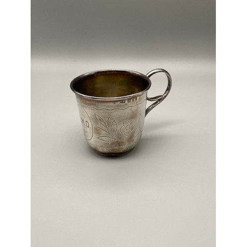 136J - A London silver christening cup engraved with initials E.M.D. London date mark 1932.