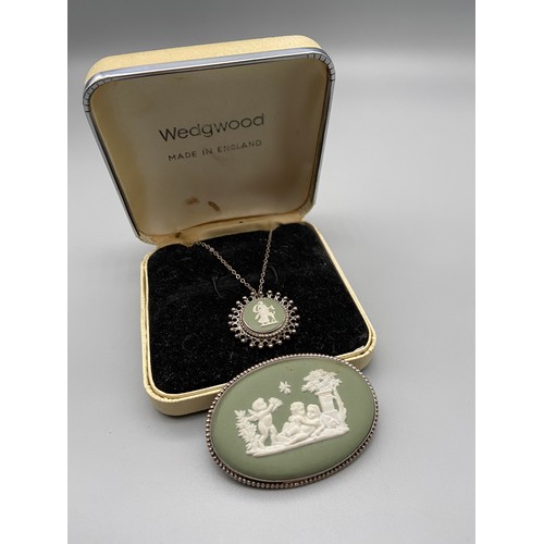 153J - A Vintage Sterling silver and Wedgwood brooch, pendant and silver chain. Comes with original box.