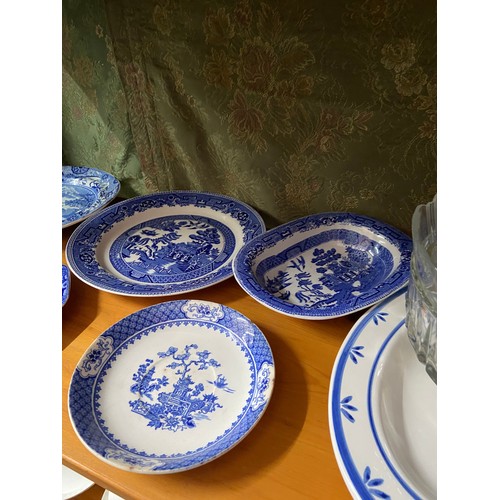 35A - A Quantity of Porcelain blue and white dishes, plates and serving plates. Also includes A Large Roya... 