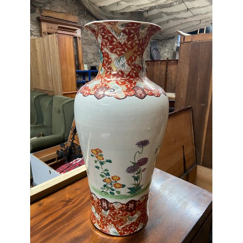 95A - A 19th century Japanese hand painted urn style vase. Depicts a large elephant reverse side detailing... 