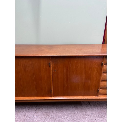 76A - A Very Stylish Retro teak mid century pedestal sideboard, designed with 5 drawers and three doors. C... 