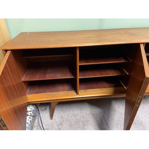 76A - A Very Stylish Retro teak mid century pedestal sideboard, designed with 5 drawers and three doors. C... 