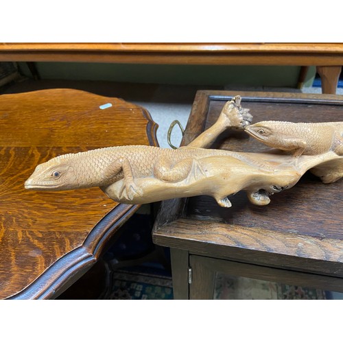 80A - A Vintage hand carved piece of drift wood detailing four lizards. [78cm length]