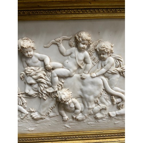 97A - A Large 20th century marble plaque featuring relief carvings of Cherubs Whimsically riding a Lion. F... 