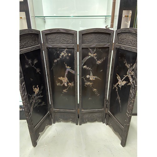 109A - A 19th century Japanese four section screen. Depicting paua shell inlaid birds against a black lacqu... 