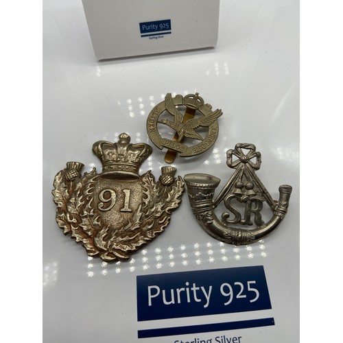 87 - A Lot of three military cap badges which includes Glider Pilot Regiment.