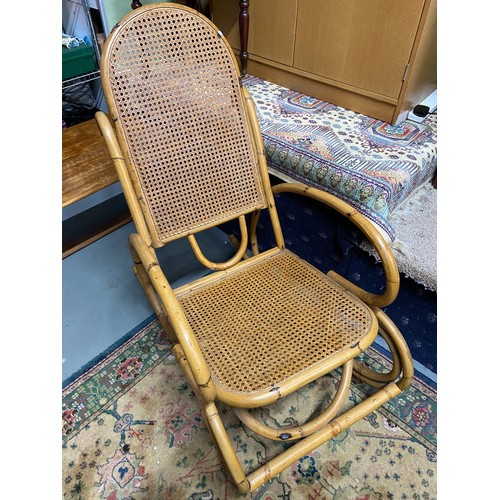 433A - A Retro bamboo and ratten back rocking chair.